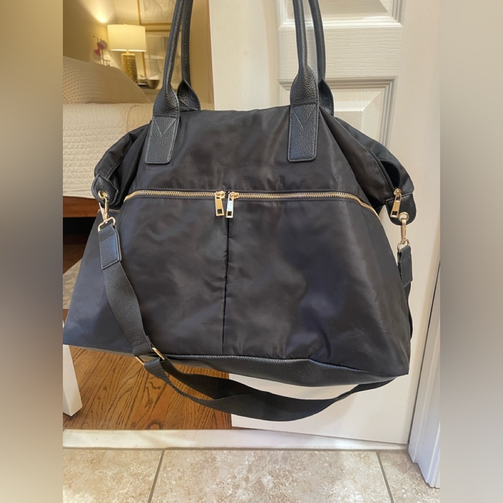 A new day nylon black weekender bag with crossbody strap/gold hardware